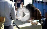 Artist carving foam into Art Venice Beach Boardwalk Ca